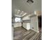 Modern kitchen featuring white cabinets and an abundance of light at 4007 W Rue De Lamour Ave, Phoenix, AZ 85029