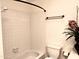 Tiled bathroom with a shower and tub combo at 4335 E Monte Way, Phoenix, AZ 85044