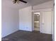 Bedroom featuring an en suite bathroom and a ceiling fan at 4335 E Monte Way, Phoenix, AZ 85044