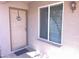 Exterior shot of front entry door and side window featuring decorative nautical wreath at 4335 E Monte Way, Phoenix, AZ 85044