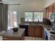 Updated kitchen featuring granite countertops, mosaic backsplash, and stainless steel appliances at 4335 E Monte Way, Phoenix, AZ 85044