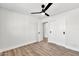 Bedroom featuring vinyl floors, a ceiling fan, and double closets at 455 E Garfield St, Tempe, AZ 85288