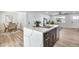 Modern kitchen island featuring sleek countertops, stylish cabinetry, and stainless steel appliances at 455 E Garfield St, Tempe, AZ 85288