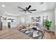 Bright and airy living area with modern decor, natural light, and a comfortable seating arrangement at 455 E Garfield St, Tempe, AZ 85288