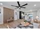 Spacious open-plan living room with modern furnishings, stylish decor, and wood flooring at 455 E Garfield St, Tempe, AZ 85288