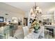 Cozy dining area with stylish chandelier and easy access to the kitchen and living spaces at 4744 E Casey Ln, Cave Creek, AZ 85331