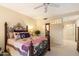 Warm bedroom showcases decorative iron bed frame, neutral walls, and soft carpet at 4744 E Casey Ln, Cave Creek, AZ 85331