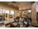 Inviting patio with wicker furniture, a dining area, and easy access to the interior through sliding doors at 4744 E Casey Ln, Cave Creek, AZ 85331