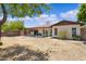 A spacious backyard perfect for outdoor activities and gardening at 4828 E Capistrano Ave, Phoenix, AZ 85044