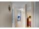 Hallway view leading to bathroom, bedroom, and living room area at 4828 E Capistrano Ave, Phoenix, AZ 85044