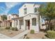 Welcoming two-story home with a covered porch and well-maintained landscaping at 5150 W Illini St, Phoenix, AZ 85043