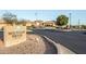 The community entrance sign reads 'Mountain Brook Golf Club' and is surrounded by lush landscaping at 5284 S Marble Dr, Gold Canyon, AZ 85118