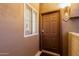 Apartment entrance with well-lit walkway and a view to apartment number at 5335 E Shea Blvd # 2102, Scottsdale, AZ 85254