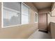 A condo's front door and window are displayed, the unit number '2102' is visible at 5335 E Shea Blvd # 2102, Scottsdale, AZ 85254