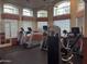 Well-equipped fitness center with treadmills, weights, and large windows at 5335 E Shea Blvd # 2102, Scottsdale, AZ 85254