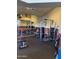 Fully equipped fitness center with mirrors, weights and fitness machines at 5335 E Shea Blvd # 2102, Scottsdale, AZ 85254