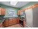Well-equipped kitchen featuring stainless steel appliances, granite countertops, and ample cabinet space at 5335 E Shea Blvd # 2102, Scottsdale, AZ 85254