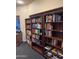 Library space boasting extensive collection of books and cozy reading area at 5335 E Shea Blvd # 2102, Scottsdale, AZ 85254