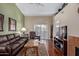 Comfortable living room featuring a high ceiling, ample natural light, and cozy seating at 5335 E Shea Blvd # 2102, Scottsdale, AZ 85254
