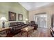 Comfortable living room with plush seating, a decorative rug, and plenty of natural light at 5335 E Shea Blvd # 2102, Scottsdale, AZ 85254