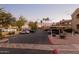 Spacious parking lot surrounded by lush landscaping and well-maintained condo buildings at 5335 E Shea Blvd # 2102, Scottsdale, AZ 85254