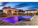 Inviting backyard pool and spa with covered patio and outdoor kitchen perfect for entertaining at 5508 N Quail Run Rd, Paradise Valley, AZ 85253