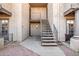 Inviting condo exterior with desert landscaping, stairs to the second level, and neutral-toned stucco at 5995 N 78Th St # 1063, Scottsdale, AZ 85250