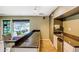 Modern kitchenette featuring granite countertops, stainless steel appliances, and bar seating at 5995 N 78Th St # 1063, Scottsdale, AZ 85250