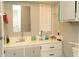 Bathroom with sink and vanity with ample counter space and mirror at 614 S 92Nd Pl, Mesa, AZ 85208