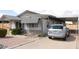 Exterior shot of covered parking area and low maintenance landscaping at 614 S 92Nd Pl, Mesa, AZ 85208