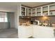 Functional kitchen with generous counter space, sink, and open cabinetry at 614 S 92Nd Pl, Mesa, AZ 85208