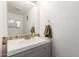 Clean bathroom featuring a modern vanity with a towel bar, and a stylish mirror at 6615 N 44Th Ave, Glendale, AZ 85301