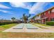 Exterior view of a beautiful community with lush greenery, lawns, and shuffleboard at 6615 N 44Th Ave, Glendale, AZ 85301