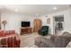 Spacious living room featuring wood-look floors and plenty of natural light at 6615 N 44Th Ave, Glendale, AZ 85301