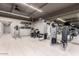 On-site gym features weight machines and a mirrored wall at 7301 E 3Rd Ave # 121, Scottsdale, AZ 85251