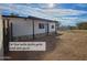 Private backyard featuring a covered patio, and a fenced yard, perfect for relaxation and outdoor entertaining at 770 S Pinal Dr, Apache Junction, AZ 85120