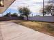 An expansive backyard offers plenty of room for activities with its large concrete patio at 770 S Pinal Dr, Apache Junction, AZ 85120