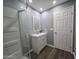 Bathroom featuring a modern tile shower, modern vanity, and lighting at 770 S Pinal Dr, Apache Junction, AZ 85120