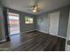 The spacious bedroom features wood floors and a ceiling fan at 770 S Pinal Dr, Apache Junction, AZ 85120