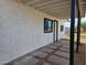 The home's exterior features a covered patio and stucco wall that provides a private entrance to the home at 770 S Pinal Dr, Apache Junction, AZ 85120