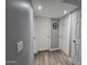 The hallway has new gray paint, three doors, and new vinyl flooring at 770 S Pinal Dr, Apache Junction, AZ 85120