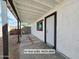This photo shows a door to the in-law suite and an entrance to a covered patio at 770 S Pinal Dr, Apache Junction, AZ 85120