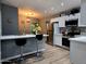 Stylish kitchen with a breakfast bar and stainless steel appliances at 770 S Pinal Dr, Apache Junction, AZ 85120