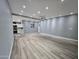 Open-concept living area featuring recessed lighting, modern flooring, and seamless transition to a contemporary kitchen at 770 S Pinal Dr, Apache Junction, AZ 85120