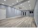 Bright living room with recessed lighting and sliding glass doors at 770 S Pinal Dr, Apache Junction, AZ 85120