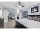 Bedroom with a sliding mirrored closet, neutral decor, and an ensuite bathroom at 904 W Juanita Ave, Mesa, AZ 85210