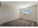 Comfortable bedroom featuring carpet, neutral walls, recessed lighting and a window with views at 1057 W West Virginia Ave, Florence, AZ 85132