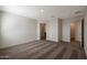 Bright bedroom featuring neutral paint, plush carpeting, and ample closet space at 1057 W West Virginia Ave, Florence, AZ 85132