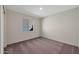 Inviting bedroom with carpet floors, light walls, and window providing natural light at 1082 W 20Th St, Florence, AZ 85132