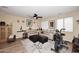 Cozy living room with hardwood floors, ample natural light, and comfortable seating at 10916 E Cholla Rd, Mesa, AZ 85207